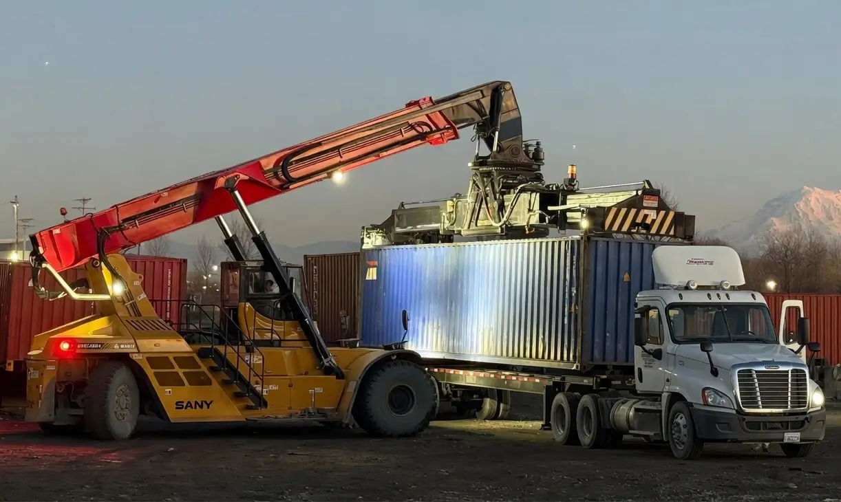 Top pick lifting cargo at the Long Road Tacoma container depot